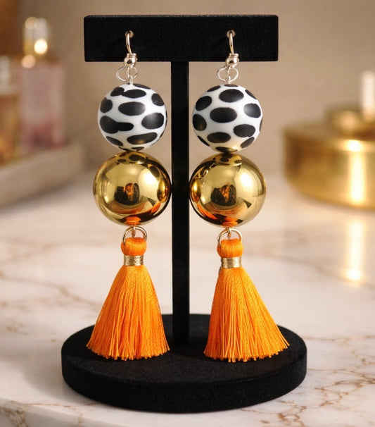 Orange and Gold Cow Print Tassel Earrings